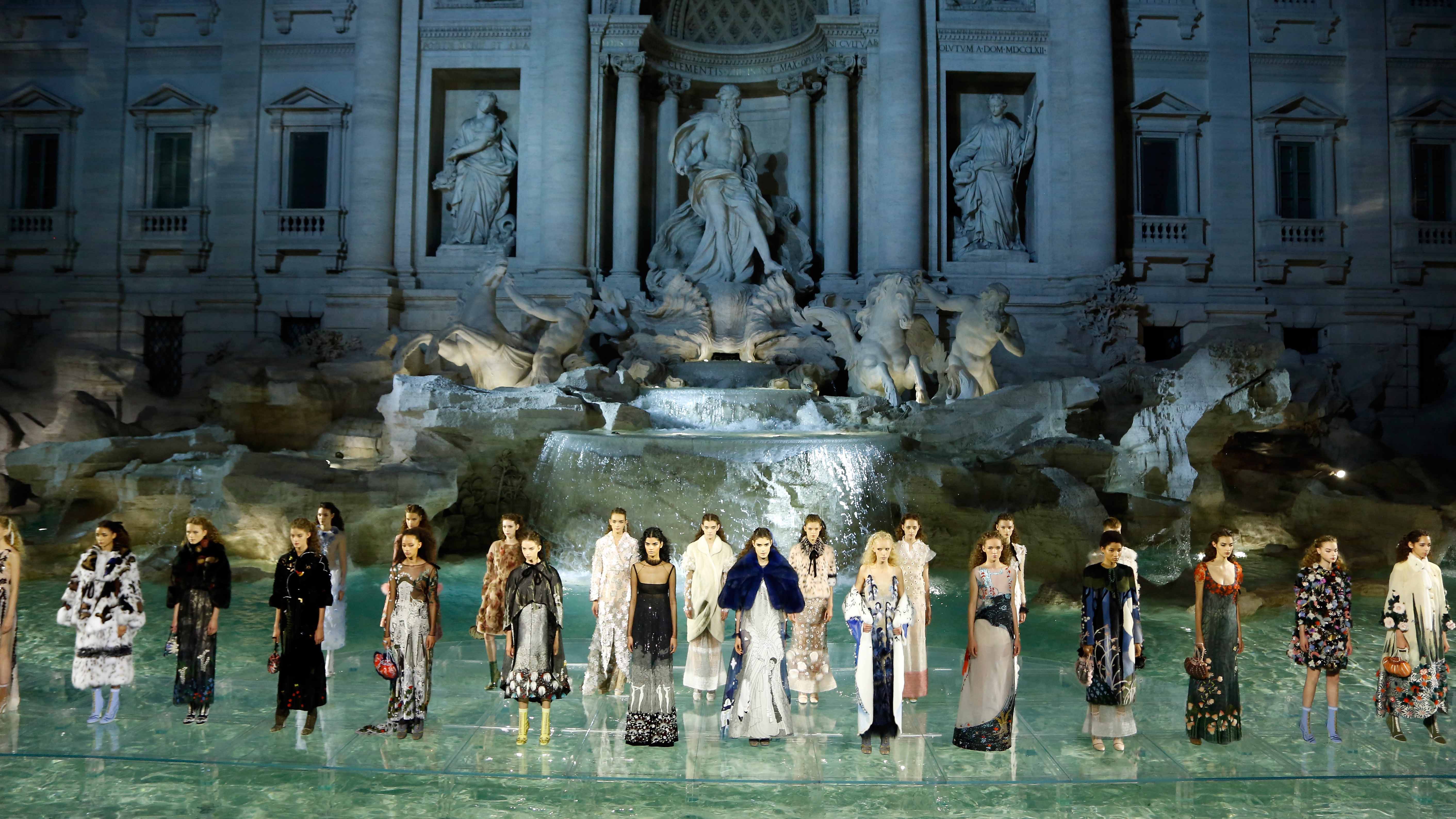 ROME, ITALY - JULY 07:  Models walk the runway at Fendi Roma 90 Years Anniversary fashion show at Fontana di Trevi on July 7, 2016 in Rome, Italy.  (Photo by Victor Boyko/Getty Images )